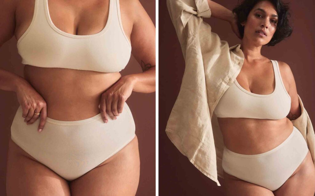 A woman wears a white organic bra and underwear set.