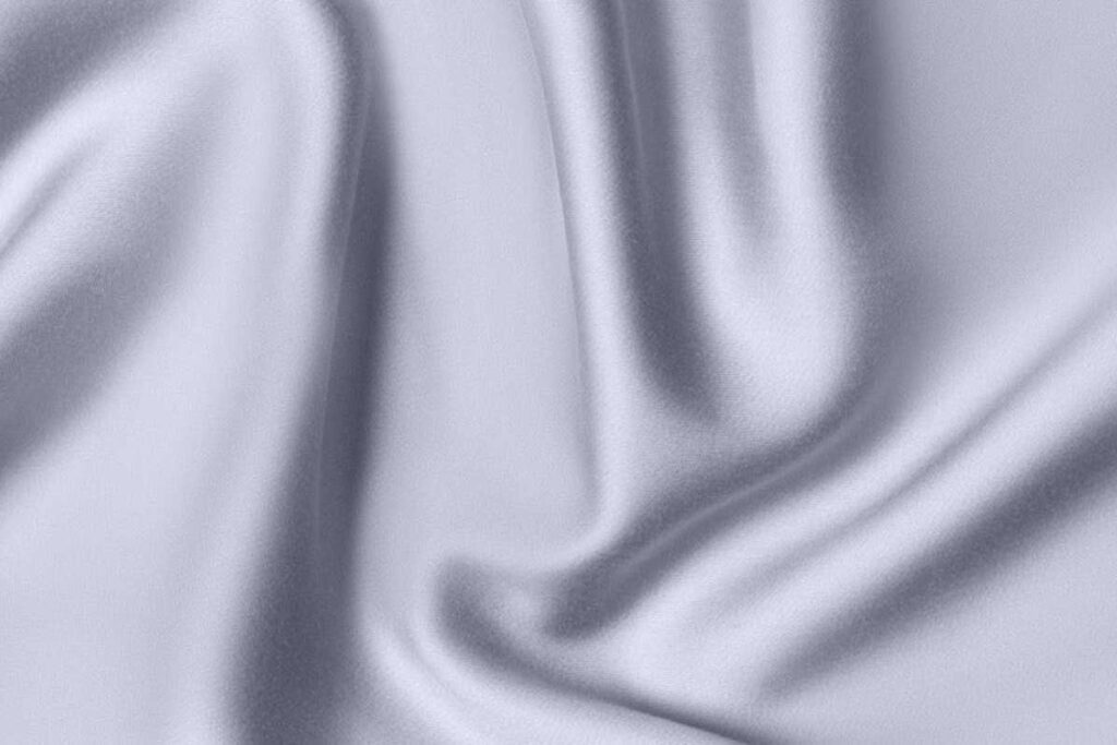 A close up image of gray-blue silk