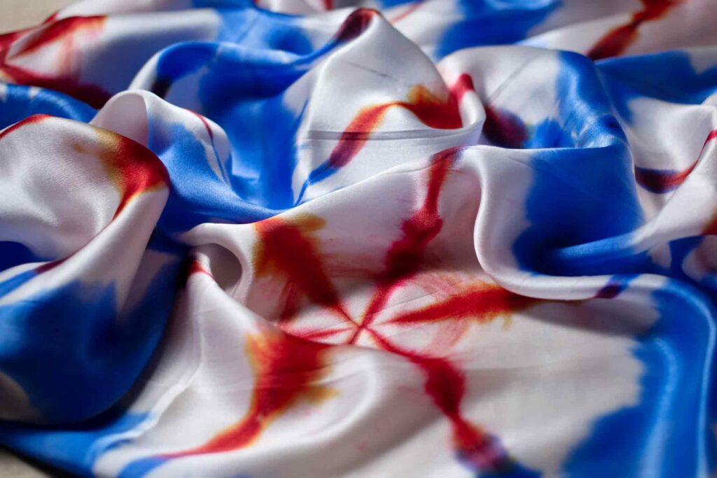 organic silk with dyed colors of red and blue
